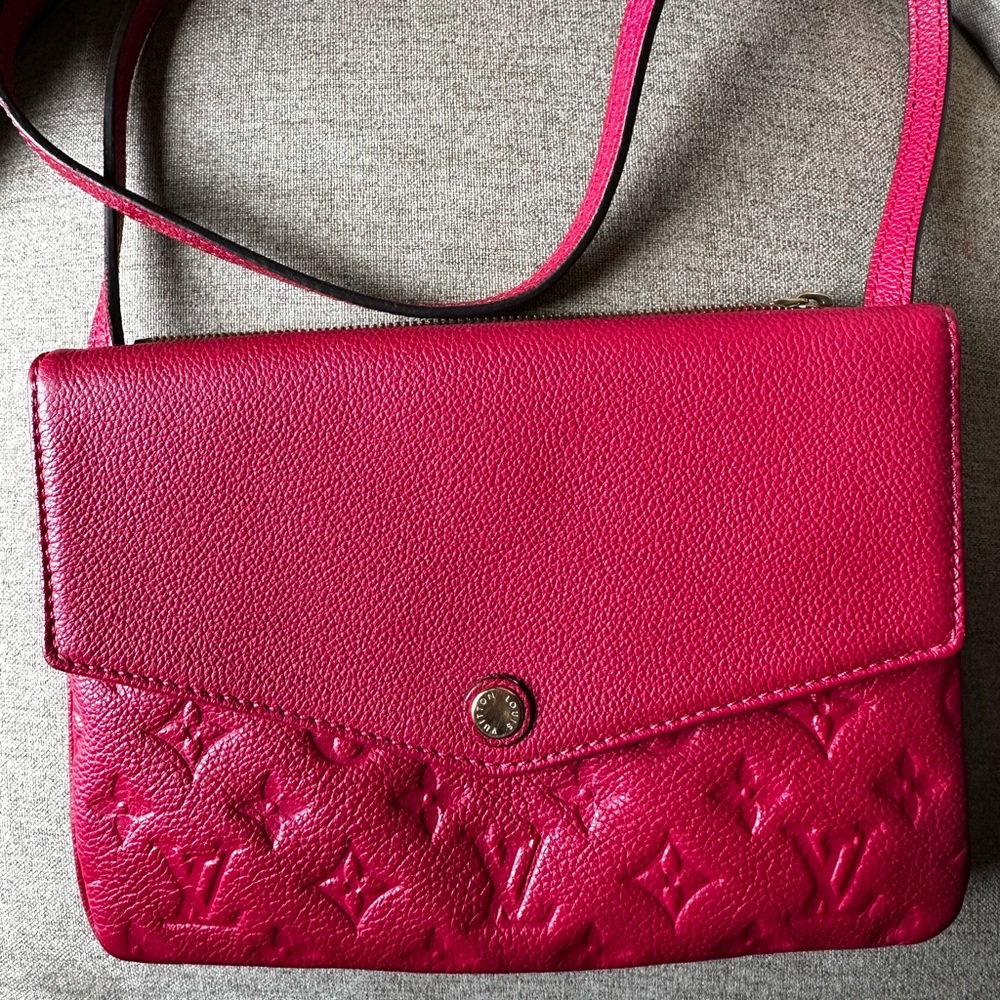 Louis Vuitton Twinset Twice Empreinte Crossbody handbag in Dahlia